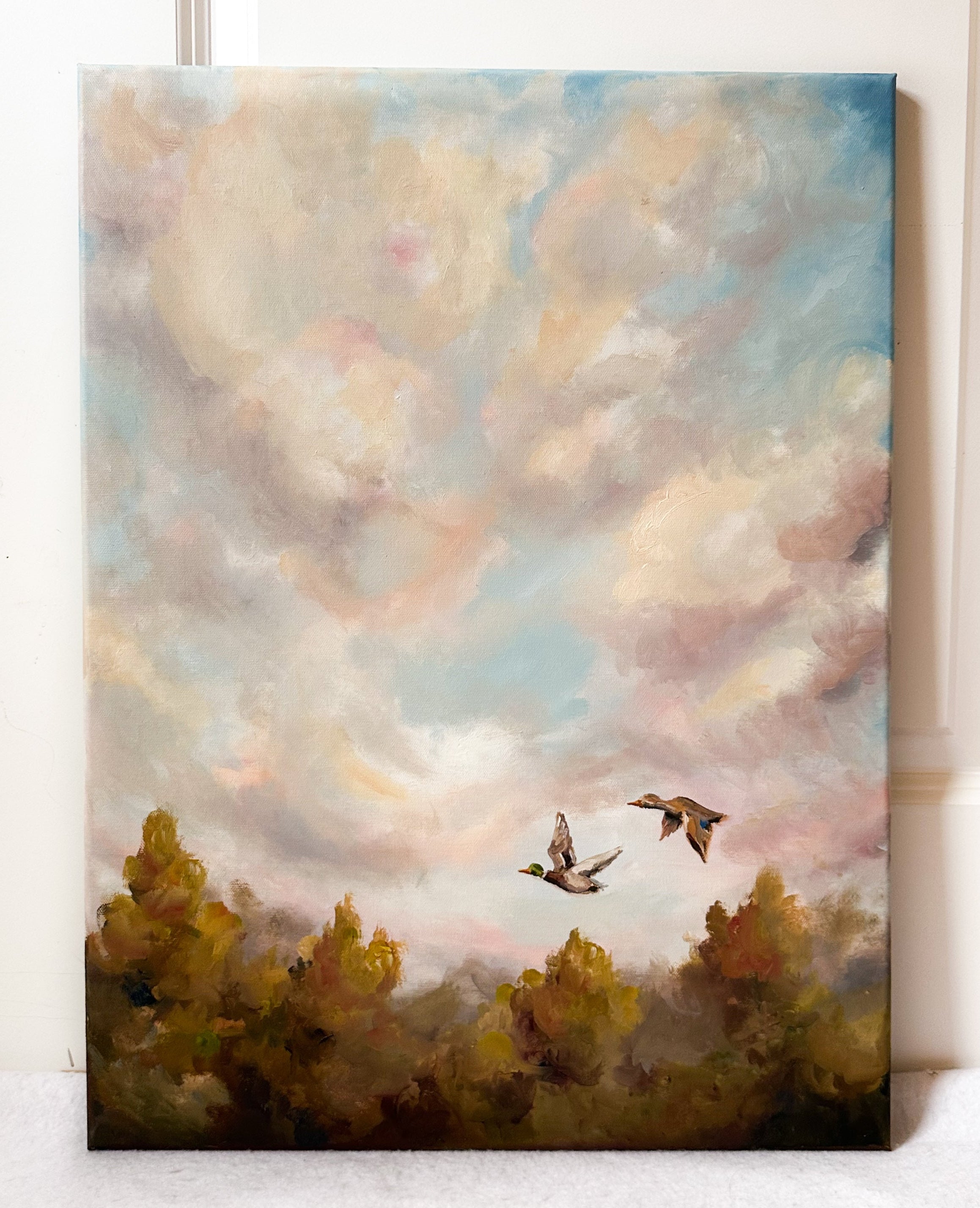 birds flying in the sky in an oil painting