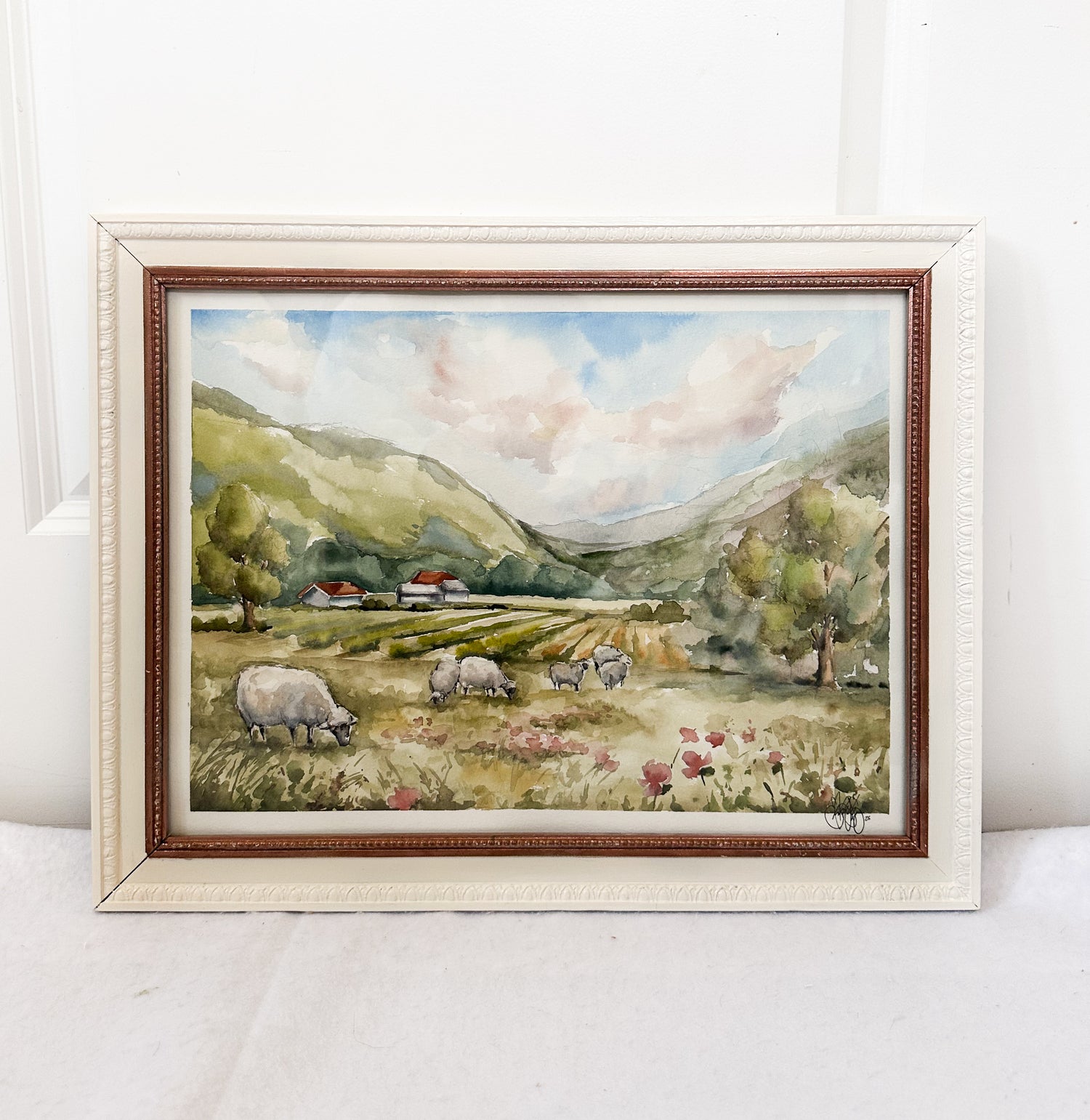 watercolor painting of sheep in a meadow